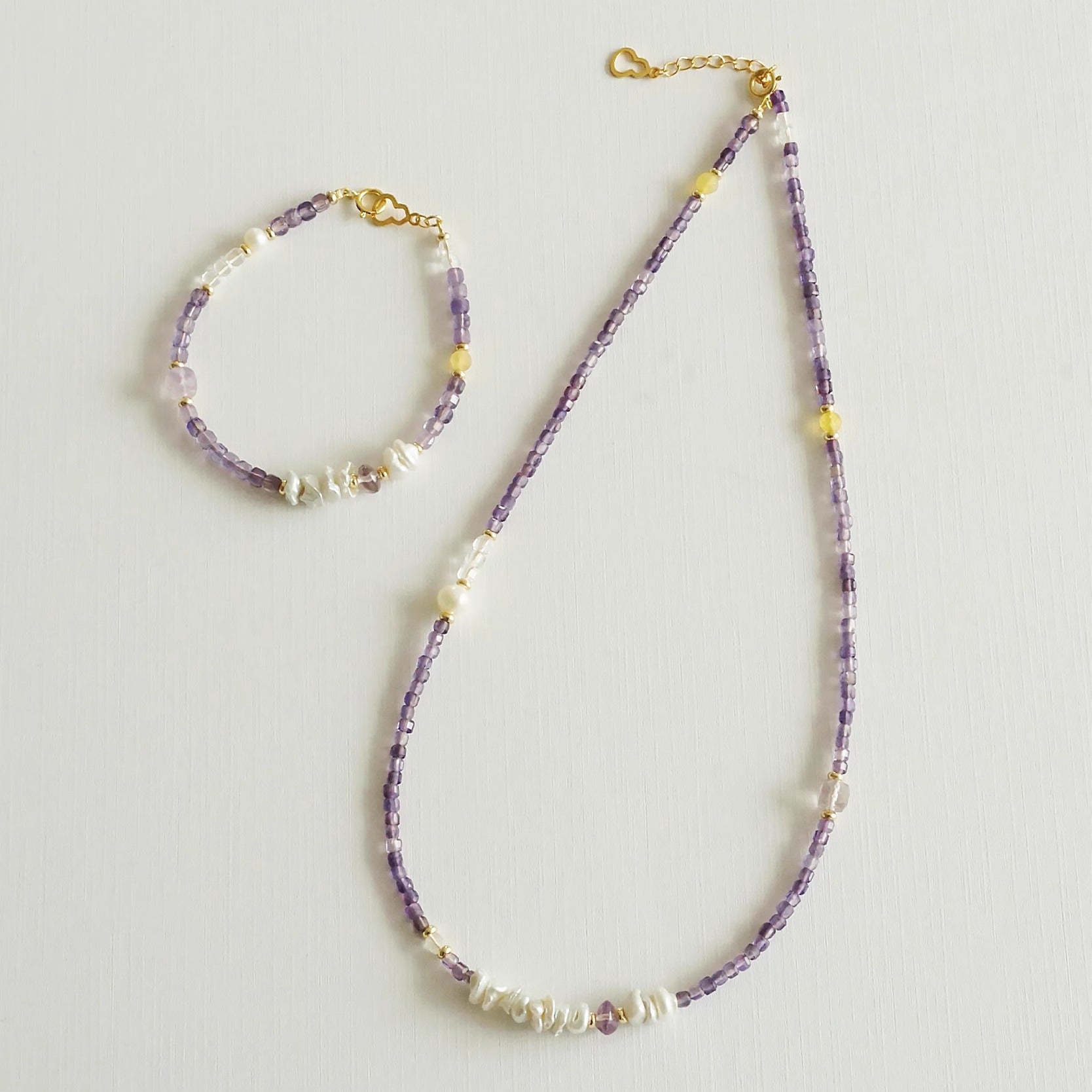 Amethyst and freshwater pearl necklace with matching bracelet