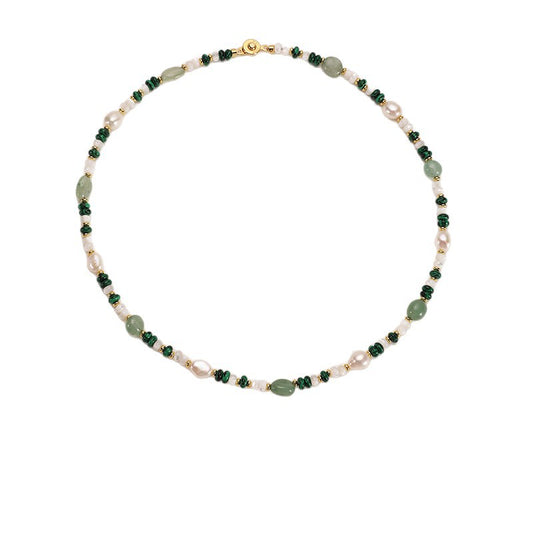 Malachite aventurine and pearl necklace on white background